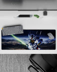 32x12 inches anime mouse pad with crisp white armor, blue panels, gold chest, and dramatic storm mood.