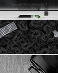 40x20 inches desk pad with topographic contour lines, blending delicate white lines with a black background for a sophisticated and minimalist design.