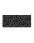 Mouse pad featuring topographic contours, 28x12 inches, with white lines over a black background, blending art and function in an elegant design.