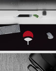Elegant 36x16 desk pad highlighting Uchiha's iconic emblem for bold yet refined anime style