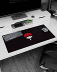 Iconic Uchiha fan artwork on 32x16 mouse pad perfect for celebrating the Sharingan's power