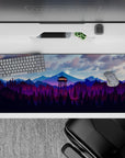 36x16 inches mouse pad with mountain forest design, blending glowing watchtower and purple-blue mountain ranges for a peaceful, nature-filled effect.