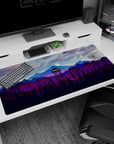 Large 40x20 inches mouse pad featuring mountain forest design, glowing watchtower, and purple-blue mountain ranges to evoke nature's tranquility.