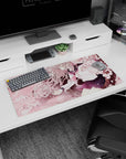 Schoolgirl leans into cherry blossoms, silver hair ribbons flowing on anime girl mouse pad 32x16 inches.