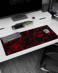 Artistic 36x16 inches mouse pad with intense red and black swirl patterns, creating a bold and edgy visual for inspiring creativity and focus.