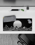 28x12 inches mouse pad with wireframe mountains and a glowing striped sun, creating a bold monochrome vaporwave look.
