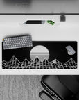 32x12 inches mouse pad featuring wireframe mountains and a glowing sun, blending monochrome and retro-futuristic design.