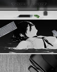 Anime desk pad 40x20 inches featuring Aki Hayakawa from Chainsaw Man in grayscale water, adding mood and art to your space.