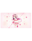 Pastel anime girl mouse pad 32x16 inches with pink bubbles, creamy backdrop, and frilly dress design.