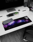 Galaxy themed desk mouse pad 32x12 inches with black, violet, and blue stardust design for modern workspace.