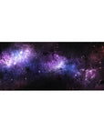 Galaxy-themed desk pad 36x16 inches with violet nebula clouds, soft blue stardust, and starry cosmic design.