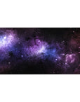 Galaxy-inspired desk pad 40x20 inches with swirling black nebula, violet haze, and soft blue stardust design.