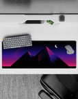 Immersive 32x12 mouse pad features sharp geometric shapes and twilight hues for vaporwave enthusiasts