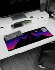 Small but impactful 32x12 mouse pad showcases Pyramid Dreams' vibrant neon pyramids and diagonal lines