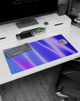 Artistic 32x16 inches mouse pad showcasing abstract wave designs in bold purples, blues, and pinks, perfect for inspiring creativity at your desk.