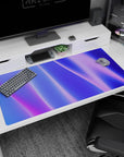 Large 40x20 inches desk pad showcasing abstract wave patterns in purples, blues, and pinks, ideal for enhancing focus and creativity at your workspace.