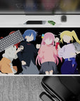 40x20 inches anime girl desk pad in bold red, blue, pink, and blonde on deep black, cozy cool vibe.