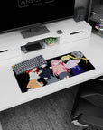 28x12 inches anime girl mouse pad showing a pink-haired girl cheering beside three friends.