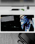 Anime mouse pad 32x16 inches featuring Bleach's Kenpachi Zaraki with blood, intense expression, and bold colors.
