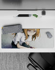 32x12 inches anime girl mouse pad in soft grayscale with warm chestnut hair and a subtle violet lens glow.