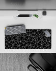 28x12 inches mouse pad with intricate angular designs, offering a modern and precise aesthetic for smaller desks.
