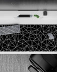 36x16 inches desk pad with intricate black-and-white angular designs, blending contemporary style and geometric precision for your workspace.