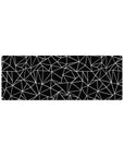Compact 32x12 inches mouse pad featuring intricate black-and-white angular designs, perfect for adding geometric flair to smaller desks.