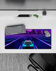 28x12 inches mouse pad with a futuristic car under neon lights, cruising through a city grid in vibrant, retro-inspired colors.