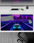 32x16 inches mouse pad with a futuristic car and city, lit in neon colors and cruising through a retro-futuristic grid.