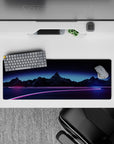 Immersive 32x12 mouse pad features neon wireframe mountains and glowing paths for vaporwave enthusiasts
