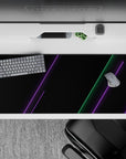 36x16 inches desk pad with cyberpunk design, featuring sharp neon green and purple lines on a sleek black backdrop for a futuristic gaming look.