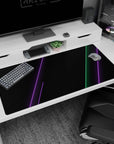 Large 40x20 inches desk pad featuring cyberpunk design, blending green and purple neon lines with a sleek black background for a tech-inspired atmosphere.