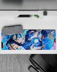 Compact 32x12 inch mouse pad highlighting Goku's dynamic intensity and Saiyan strength for fans