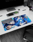 Durable 32x16 inch mouse pad with Goku's energy surge design, bringing intensity to any workspace