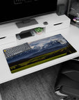 Modern 32x16 inches mouse pad showcasing snow-capped peaks and vibrant greenery for a serene, dynamic landscape.
