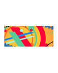 Mouse pad featuring vibrant abstract design, 28x12 inches, with red, blue, green, and yellow strokes for a lively and creative workspace.