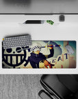 Commanding 32x12 mouse pad features Trafalgar Law's tactical stance for fans of One Piece's sharp strategist