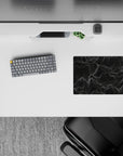 Small-sized 14x10 desk mat with abstract design adds sleek, modern energy to any desk or workspace