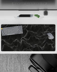 Dynamic 32x16 desk mat combines delicate lines and deep tones for impactful yet calming visuals