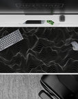 Elegant 40x20 desk pad showcases linear wave design with serene movement for a sleek workspace aesthetic