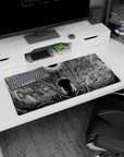 Modern 32x16 inches mouse pad featuring swirling shadows and intricate patterns in the sky, with Guts beneath the Eclipse, perfect for adding intensity to your workspace.
