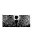 Mouse pad featuring Guts beneath the Eclipse, 28x12 inches, with shadows swirling around him and intricate patterns filling the sky, perfect for a dark, intense desk setup.