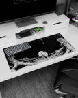 Modern 32x16 inches mouse pad showcasing the creature from Berserk, surrounded by eerie darkness and minimalist design, perfect for a dark and moody desk setup.