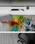 36x16 inches desk pad with dynamic brushstroke patterns in vibrant colors, blending artistic energy and depth for a creative desk setup.