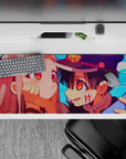 36x16 inches anime desk pad in sky-blue with warm peach shading and vivid amber eyes, playful romance mood.