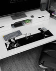 Anime mouse pad 32x16 inches featuring Itachi Uchiha from Naruto and Gojo Satoru from Jujutsu Kaisen in black-and-white design.