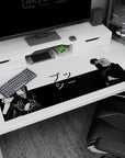 Anime desk pad 40x20 inches featuring Itachi Uchiha from Naruto and Gojo Satoru from Jujutsu Kaisen in split monochrome design.