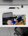 Mouse pad featuring Team 7 from Naruto in vibrant colors, size 28x12 inches, showcasing Naruto, Sasuke, Sakura, and Kakashi.