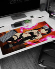 Raven-haired anime girl with glowing eyes and battle scuffs on steel floor desk pad 40x20 inches.