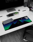 Artistic 32x12 inches mouse pad with geometric pyramids in neon colors, illuminated under a crescent moon.